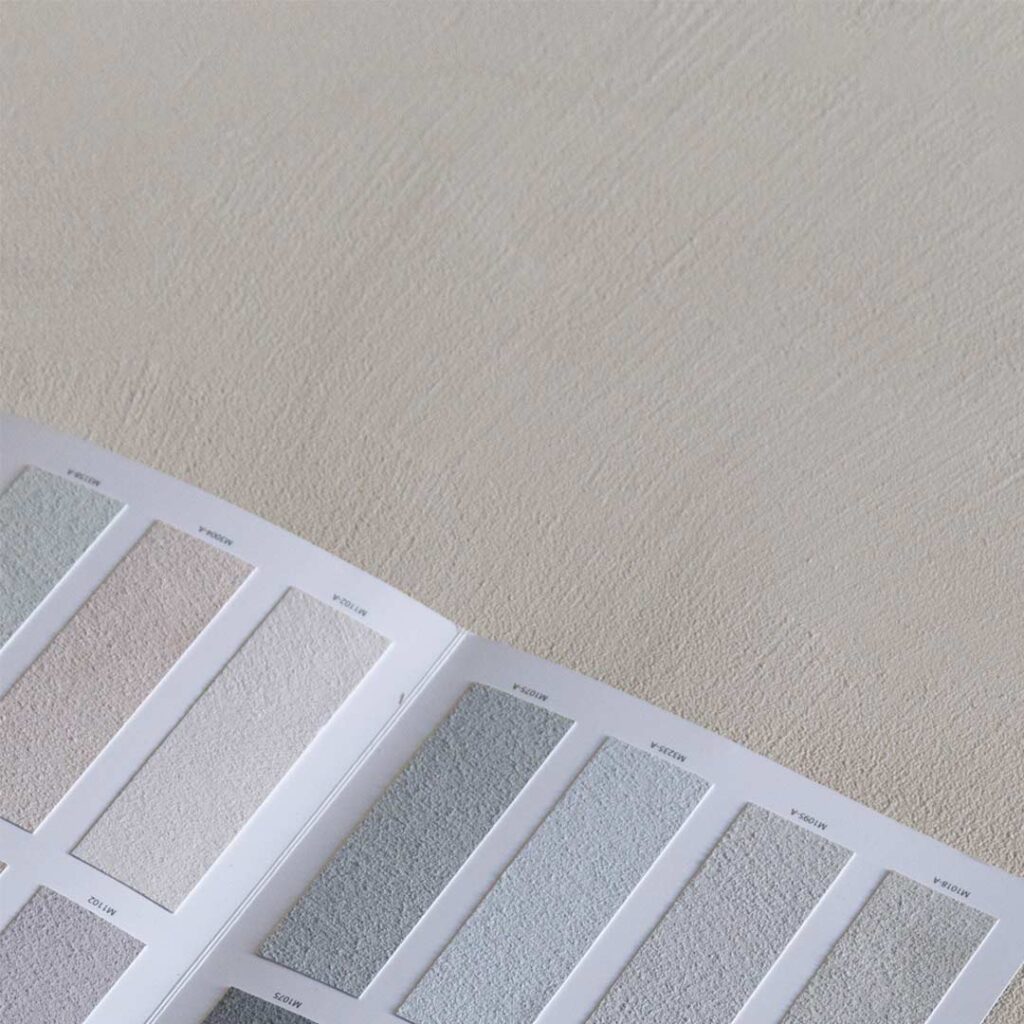 Color chart next to a zoomed-in decorative wall finish showcasing material and color matching