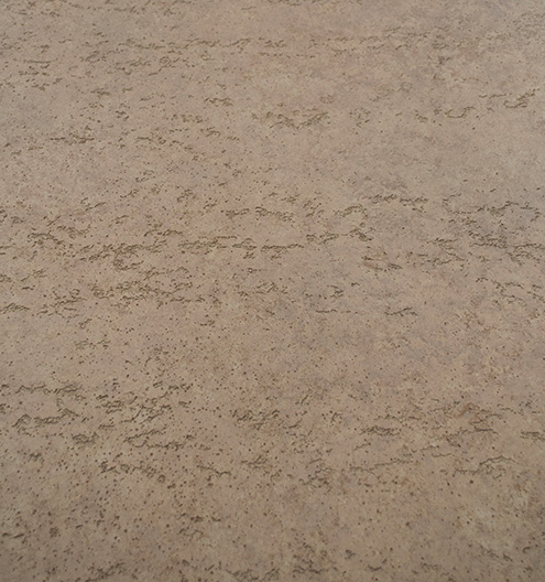 Travertine effect textured paint with vertical grooves for stone wall finish in UAE interiors