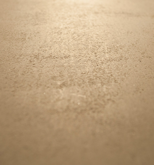 Polished plaster texture close-up with glossy marble-like finish on wall in Dubai interior