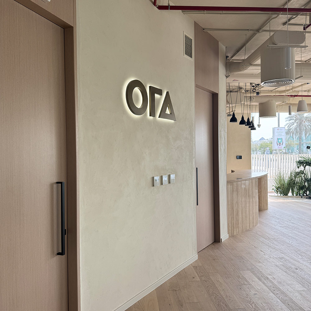 Decorative wall paint in beige at Ora Experience Center Dubai