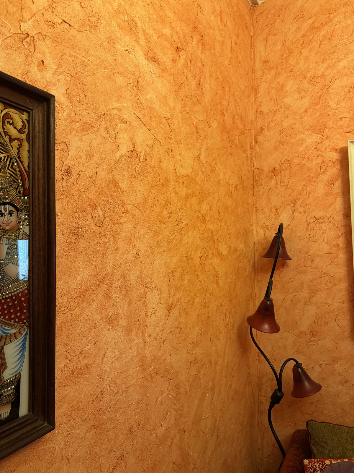 Warm ochre finish with expressive hand-worked movement
