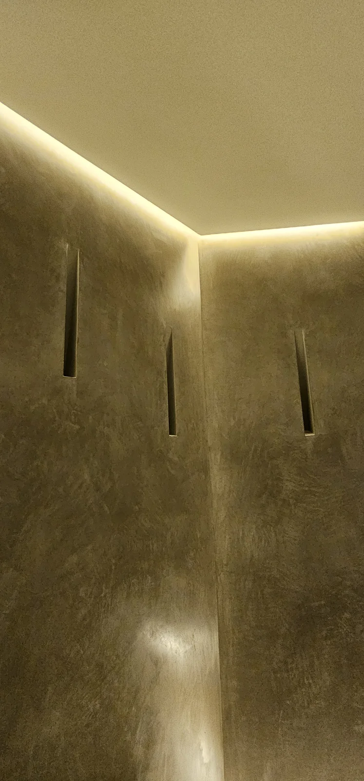 Softly polished texture under concealed lighting