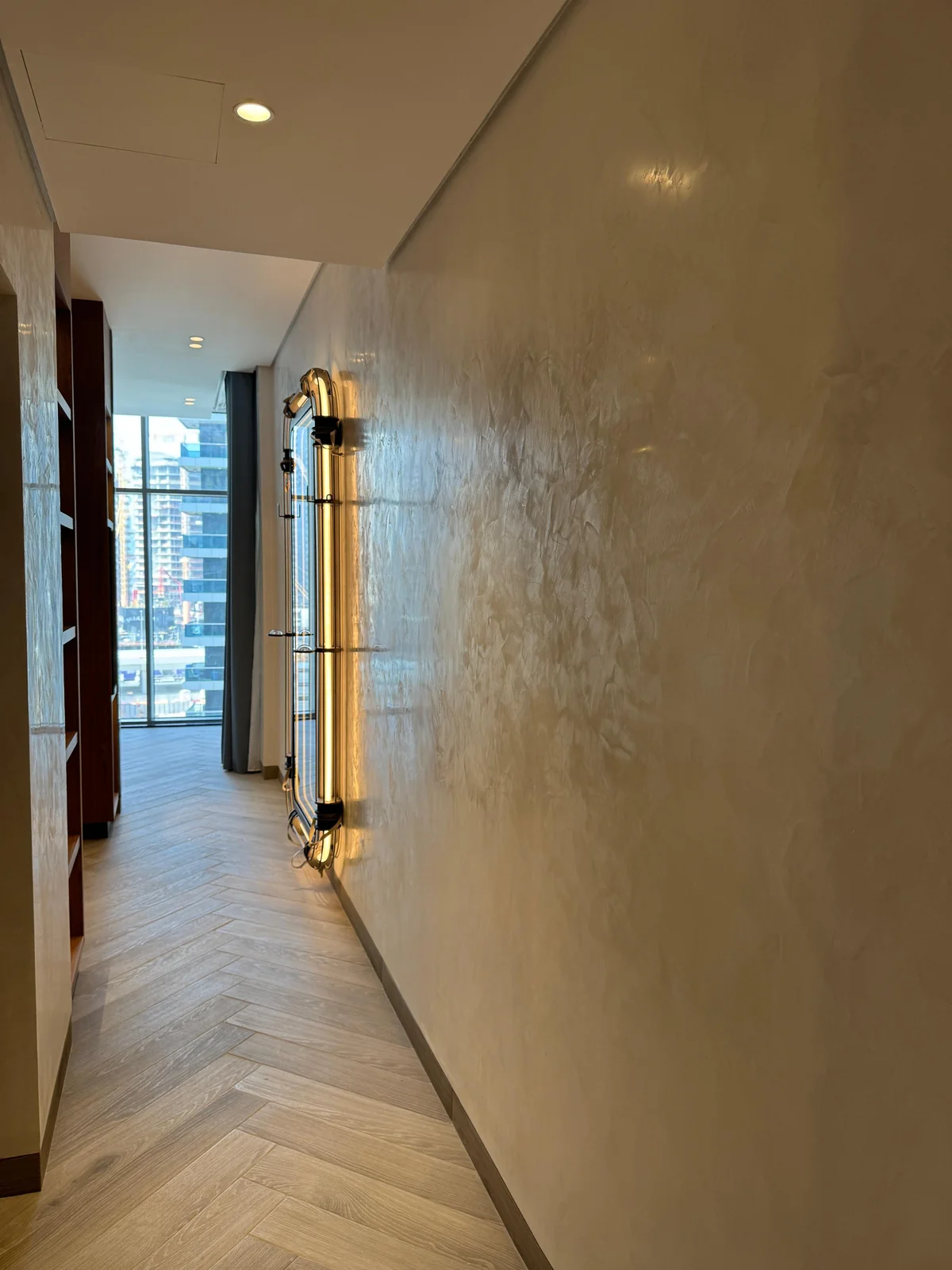 Warm polished finish along a hallway